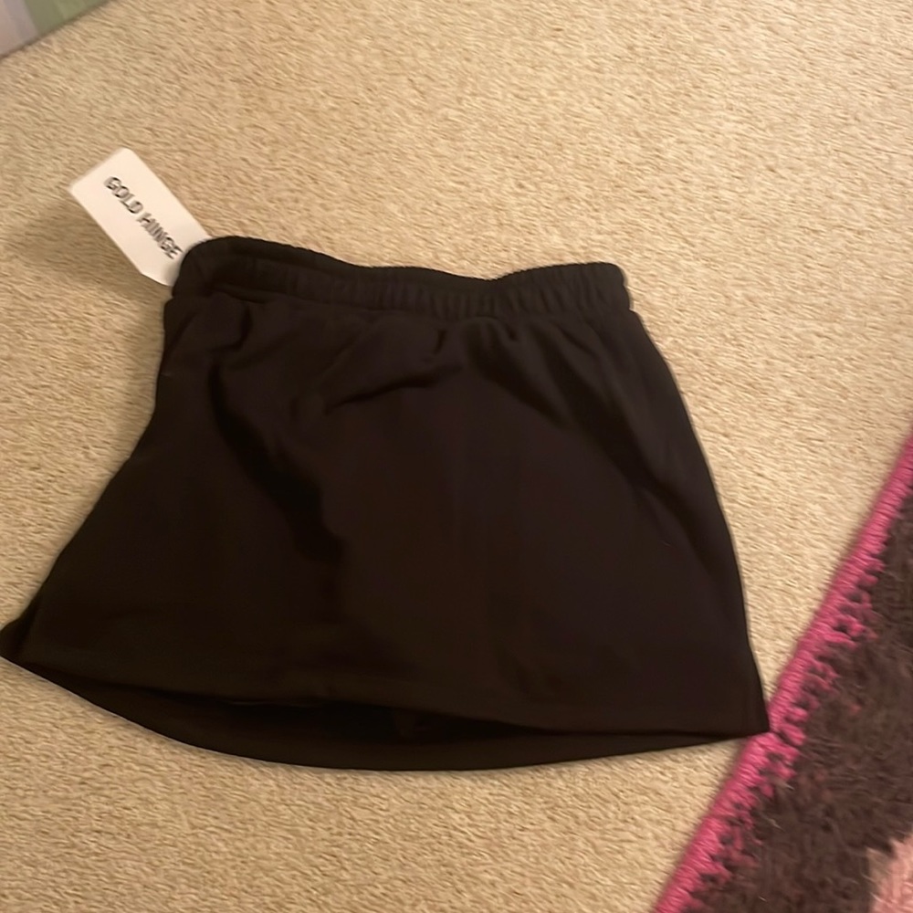 Selling gold hinge skirt!!